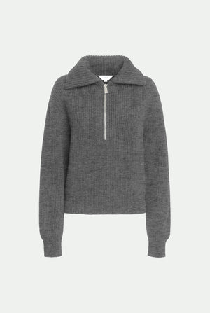 Polo côtelé zippé en 100 % cachemire